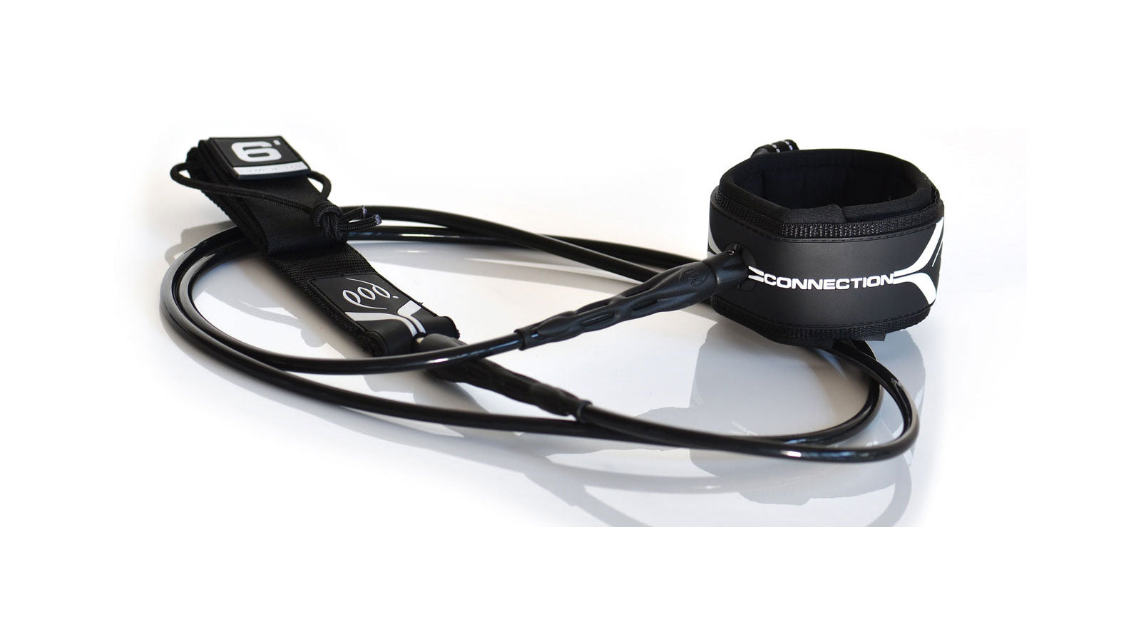 POD Connection 6-foot surfboard leash in black with padded ankle cuff, rail saver, and straight cord coiled on a white background