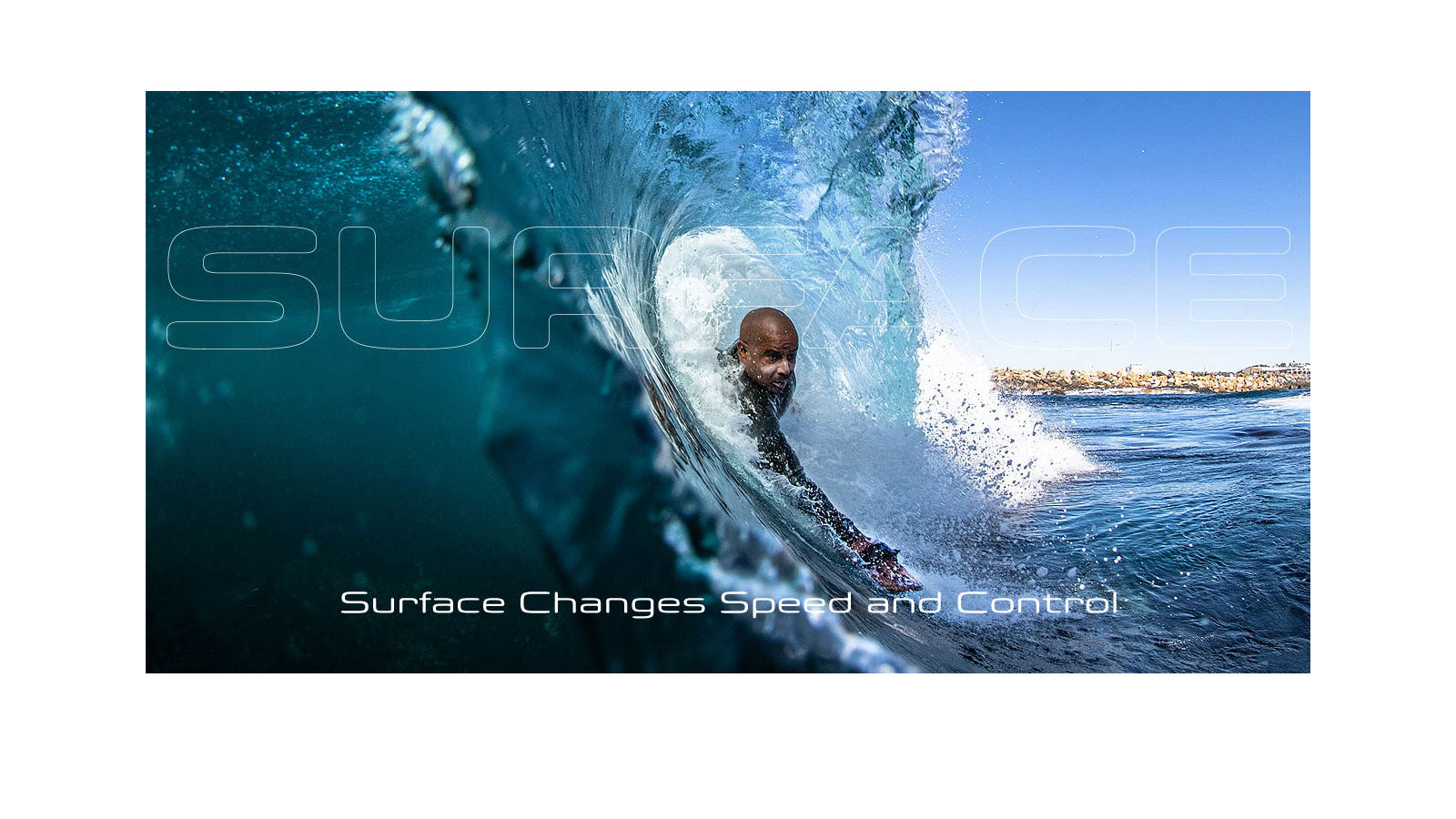 A bodysurfer riding deep inside a large hollow wave near a rock break wall, with the word "SURFACE" overlaid in large outline lettering and the text "Surface Changes Speed and Control" below