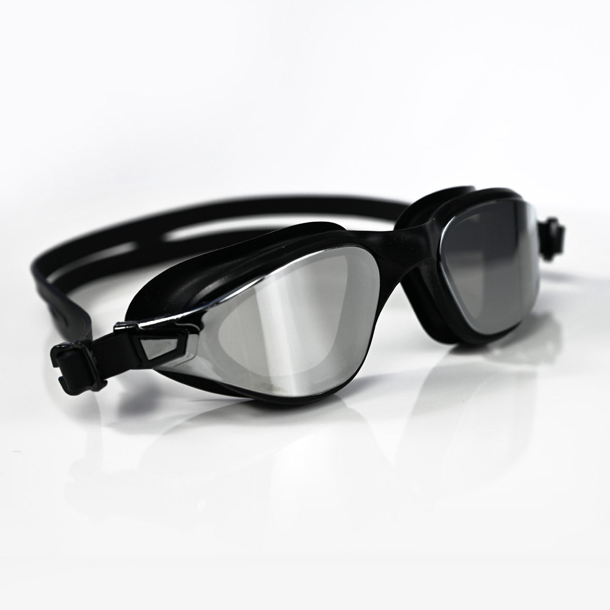Black Max swimming goggles with a reflective silver mirrored lens, shown on a clean white reflective surface.